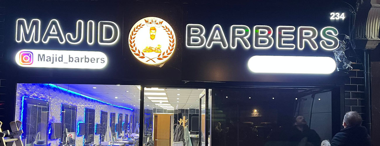 Shop front signage, illuminated letters, LED illuminated sign, Majid barbers london, shop signs London