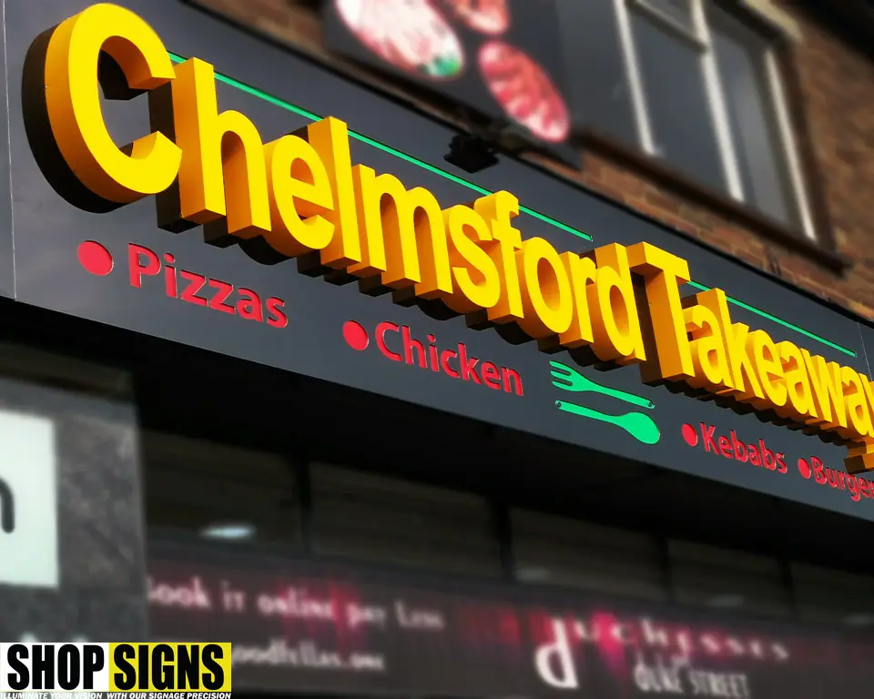 Built-up 3D shop sign with bold yellow letters for a takeaway restaurant in London